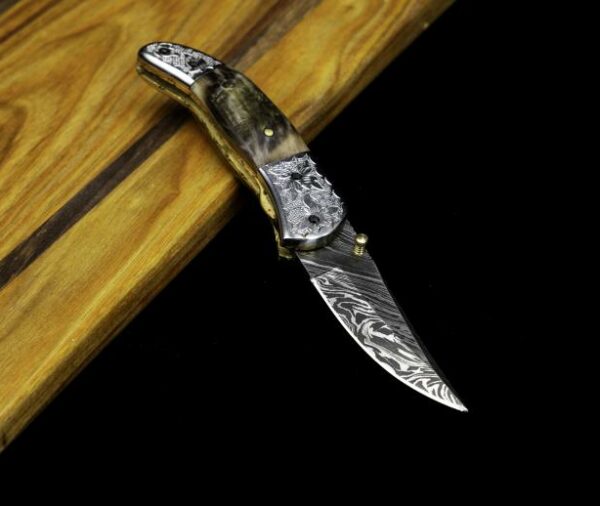 Damascus Folder with Rams Horn Handle