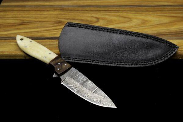 Damascus Knife with Scrimshaw Buffalo Bone Handle and Nice Filework